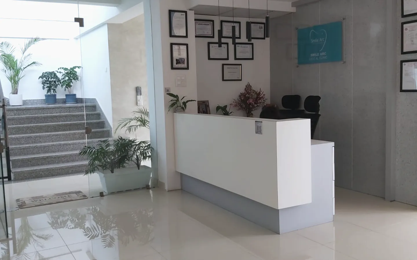 Reception desk and clinic entrance at Smile Arc Dental Clinic in Lalitpur